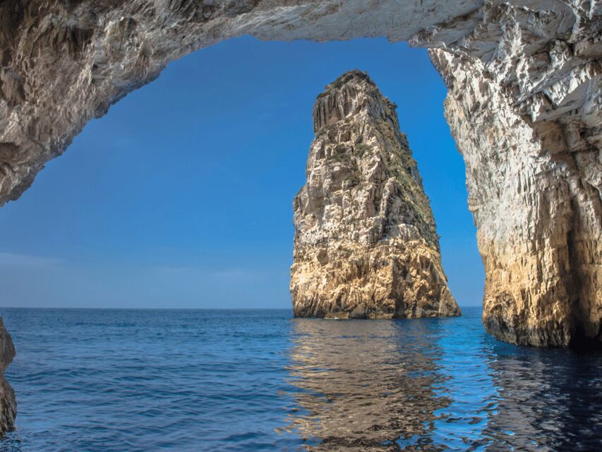 Corfu: Paxos Island Full-Day Cruise with Blue Caves - Paxos time in Gaios: narrow streets, shopping, and real harbor life