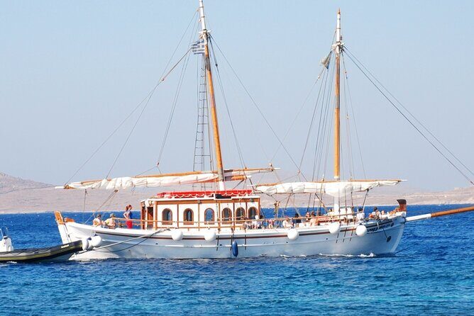Corfu: Sunset Cruise on a Wooden Vessel with Cocktails & Bites - Stop 2: Garitsa Bay for a calmer, close-to-town sunset mood