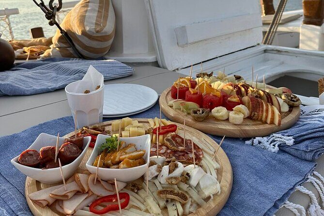 Corfu: Sunset Cruise on a Wooden Vessel with Cocktails & Bites - Stop 4: Mouse Island (Pontikonisi) and the Pantokrator Church scene