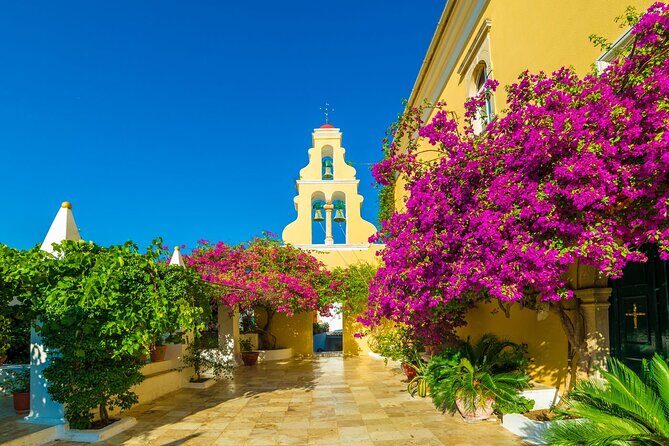 Small Group Corfu Town & Island Sightseeing Tour - Paleokastritsa: bays, the Ropa meadow crossing, and a 13th-century monastery